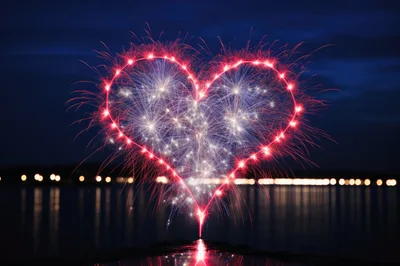 Heart Shaped Fireworks Display Over Water