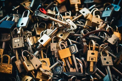 Pile Of Metal Padlocks And Keys