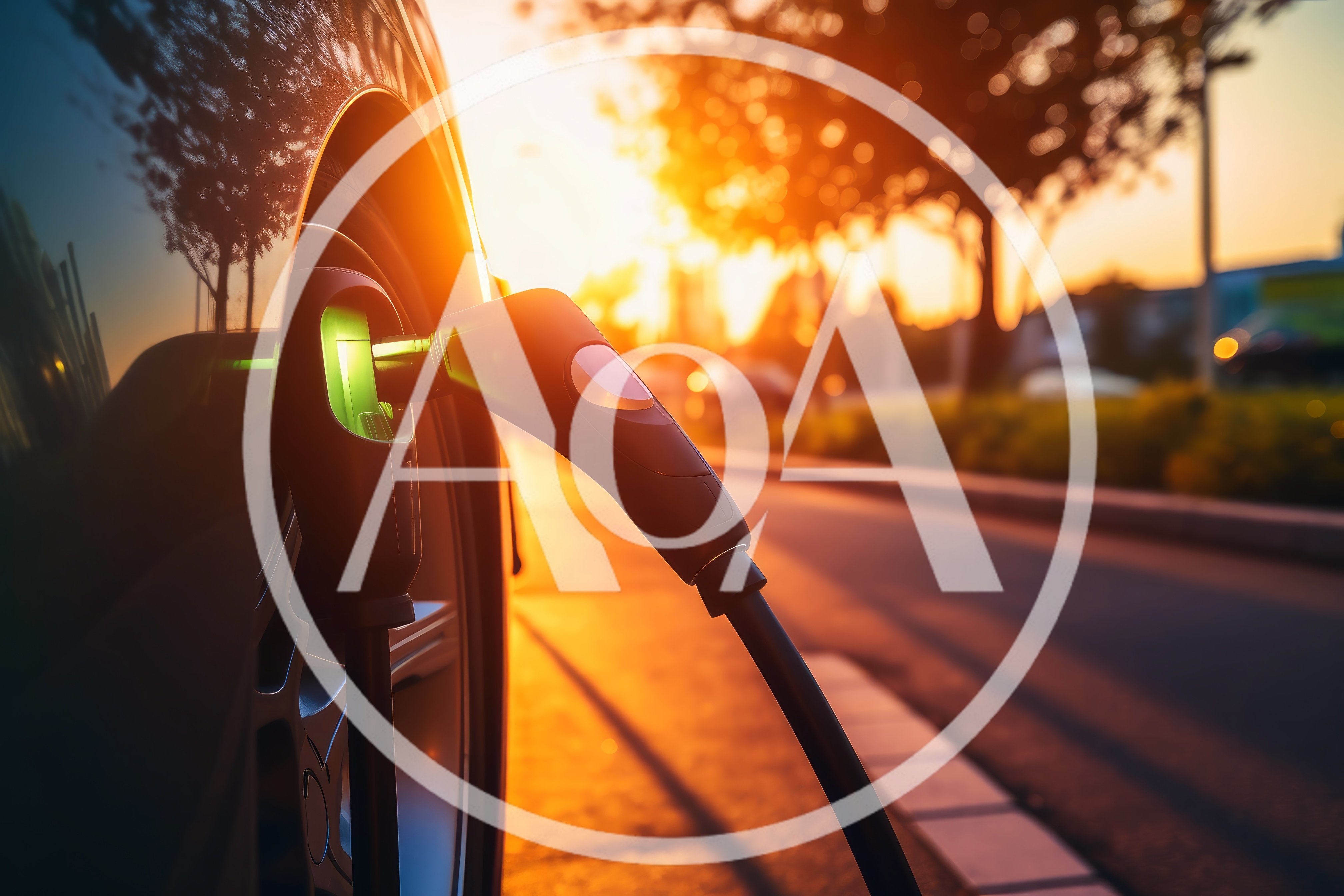 Electric Vehicle Charging At Sunset