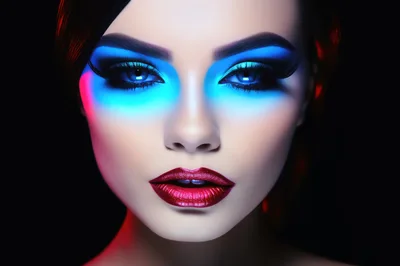 Portrait Of A Woman With Neon Makeup