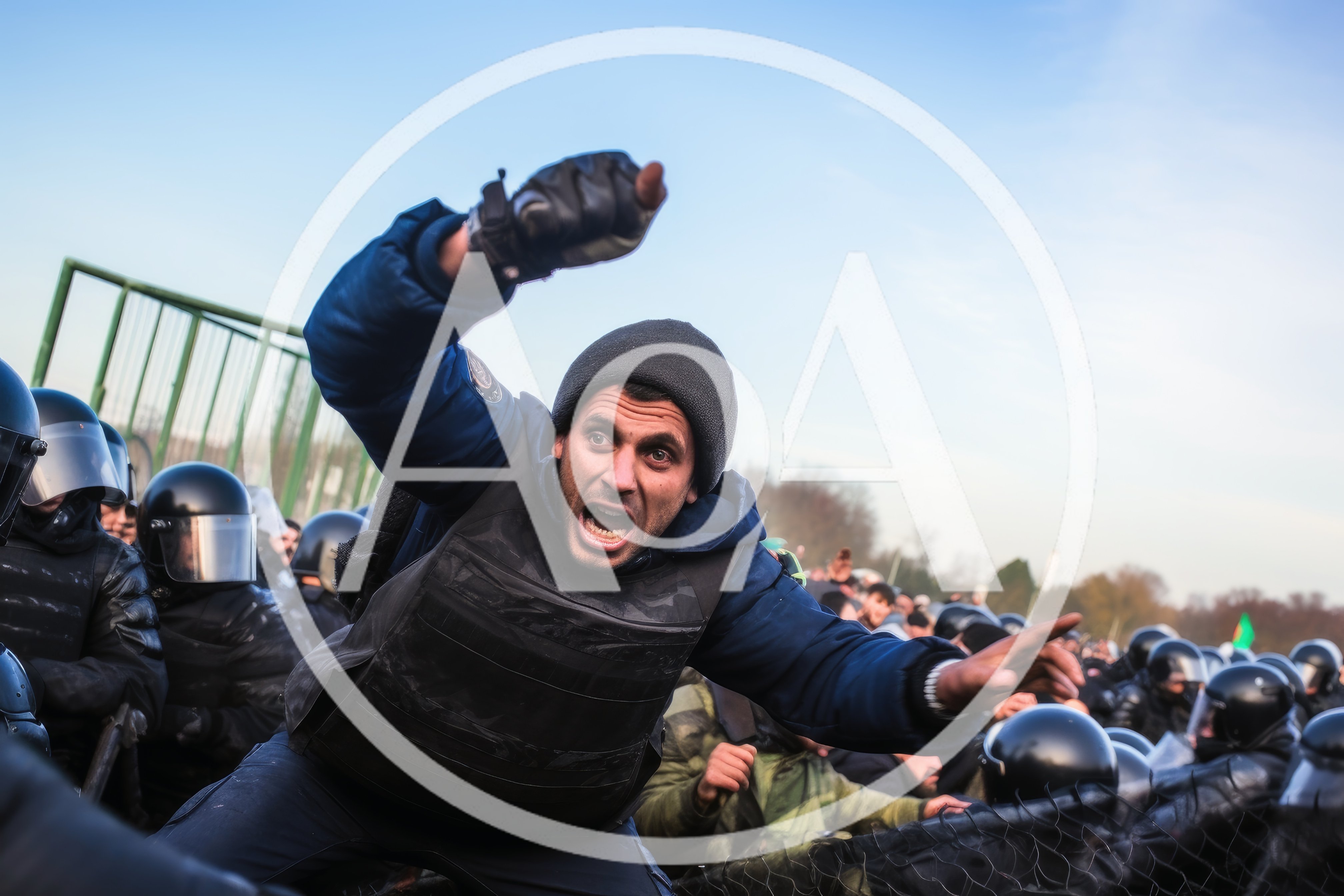 Protester Confronting Riot Police During Civil Unrest