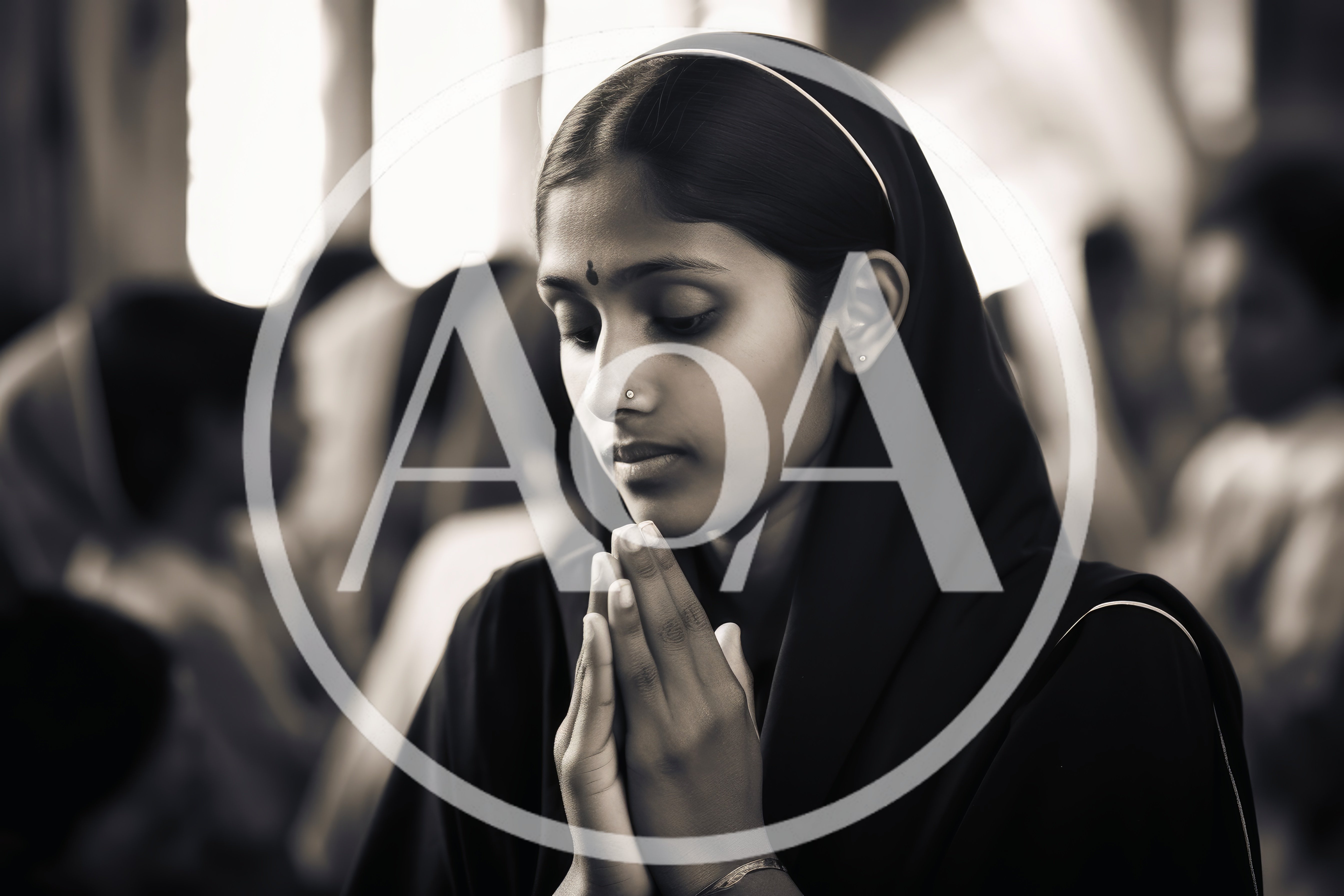 Young Indian Woman Praying With Hands Clasped