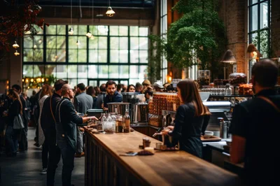 Busy Coffee Shop Interior With Baristas And Customers