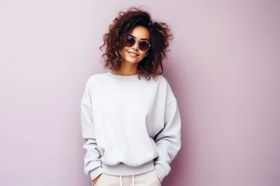 Young Woman With Curly Hair Wearing Sunglasses