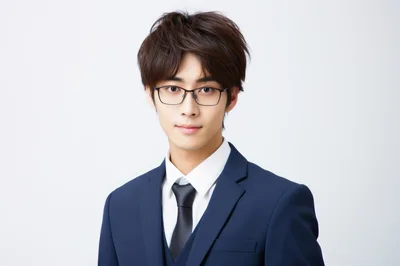 Portrait Of A Young Asian Businessman In A Suit