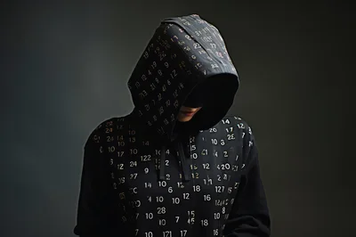 Person Wearing A Number Patterned Hoodie