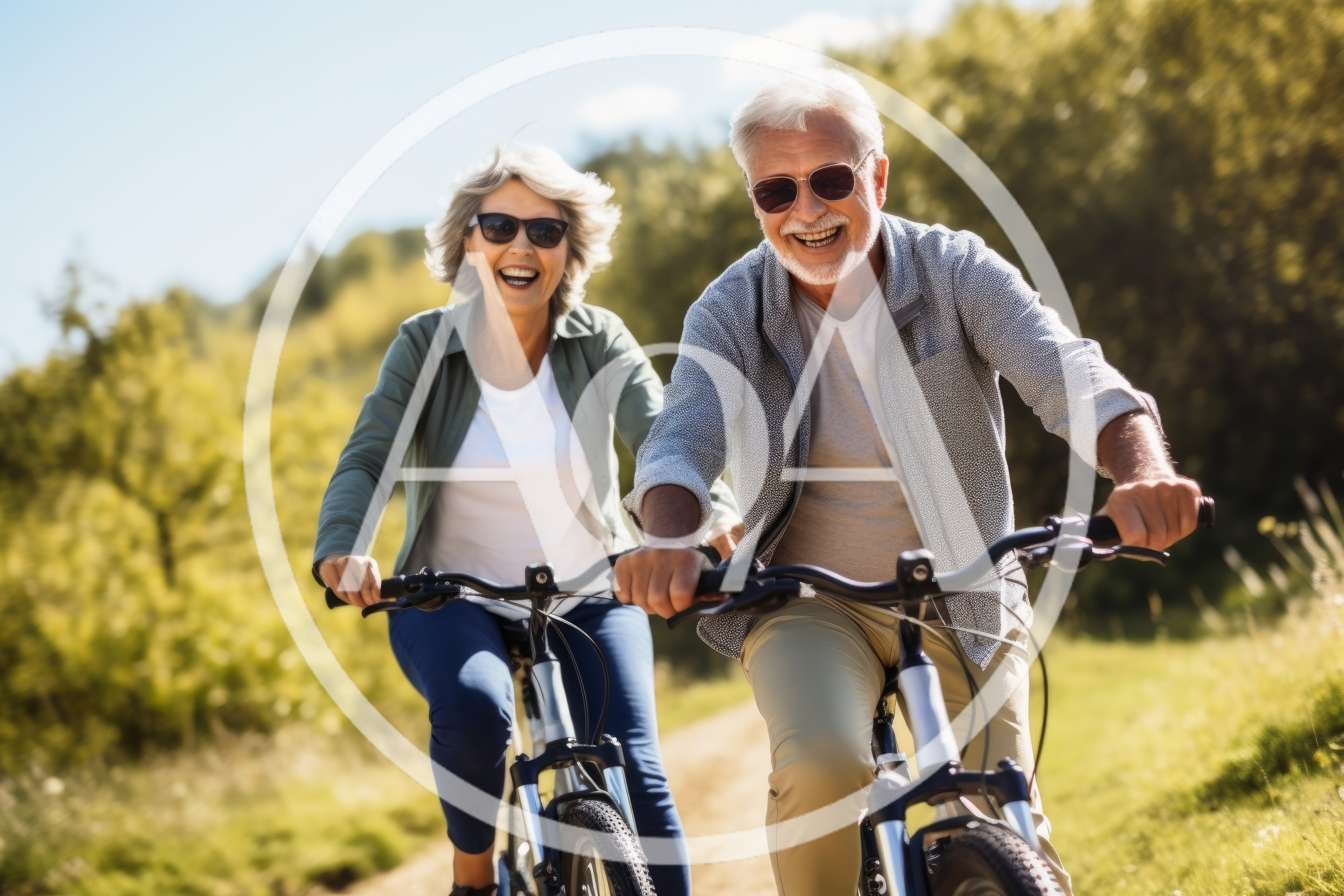 Happy Senior Couple Cycling on Countryside Path