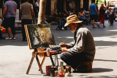 Street Artist Painting A Portrait On A Pedestrian Walkway