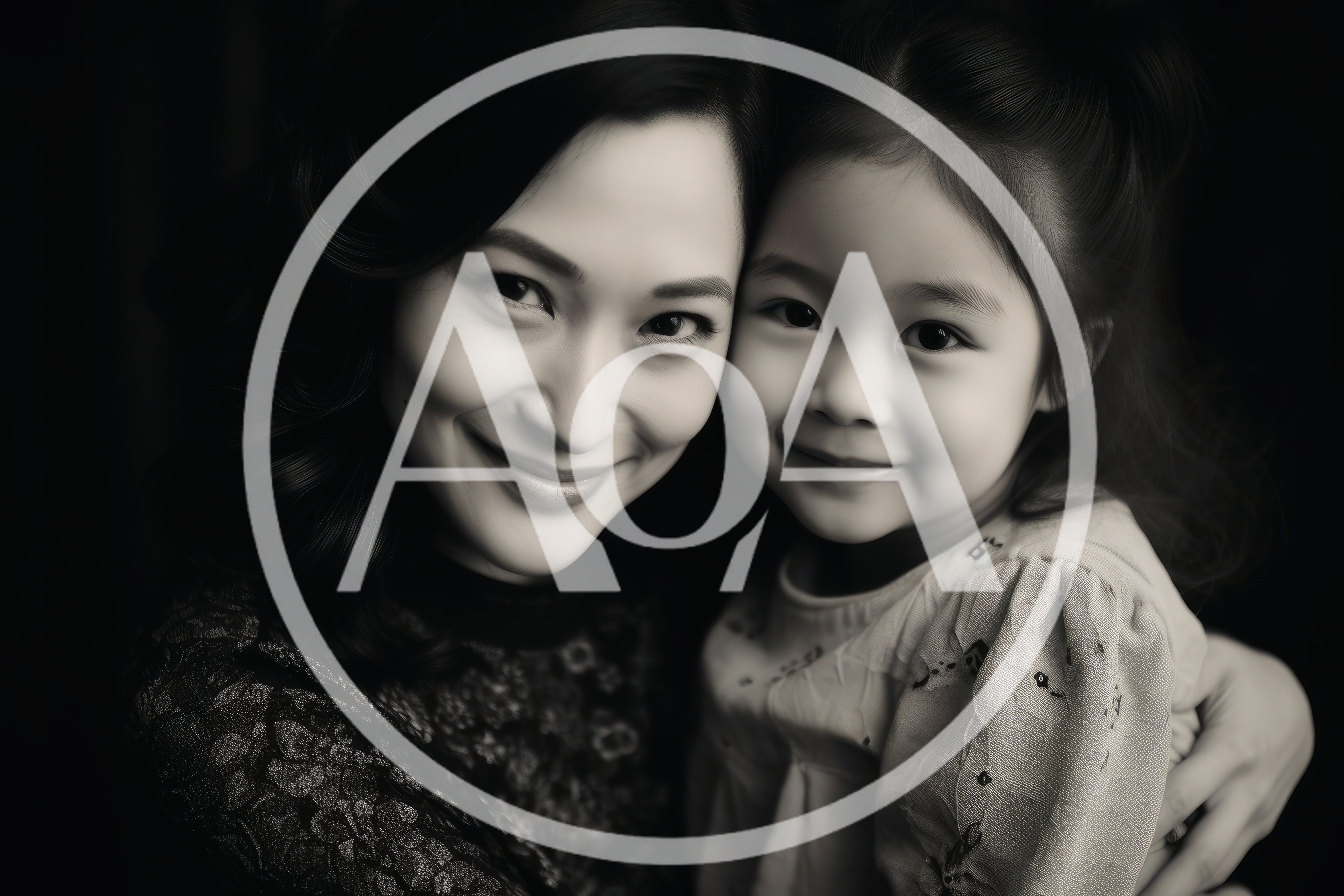 Portrait Of A Smiling Mother And Young Daughter