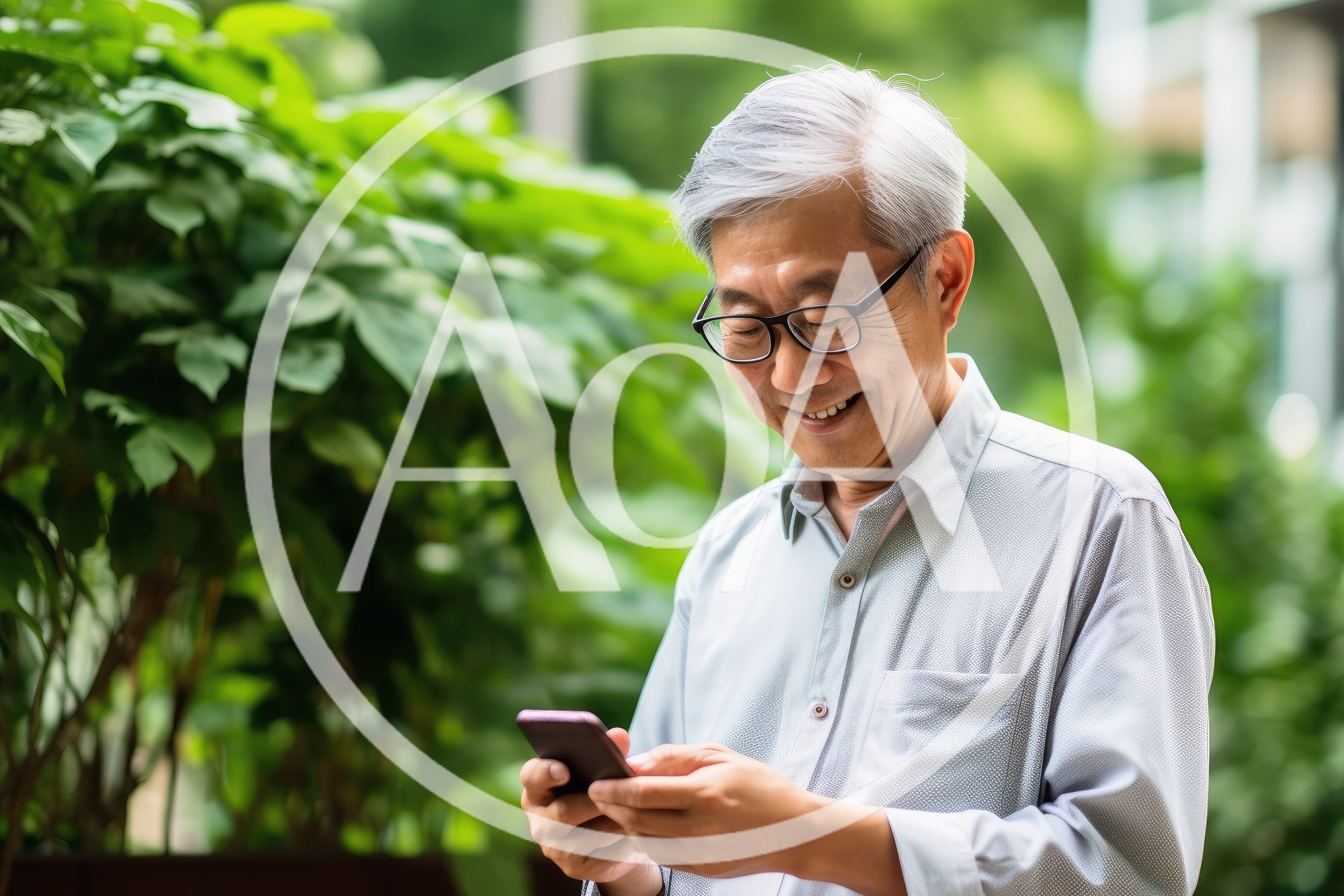 Senior Asian Man Using Smartphone Outdoors