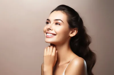 Portrait Of A Smiling Woman With Radiant Skin