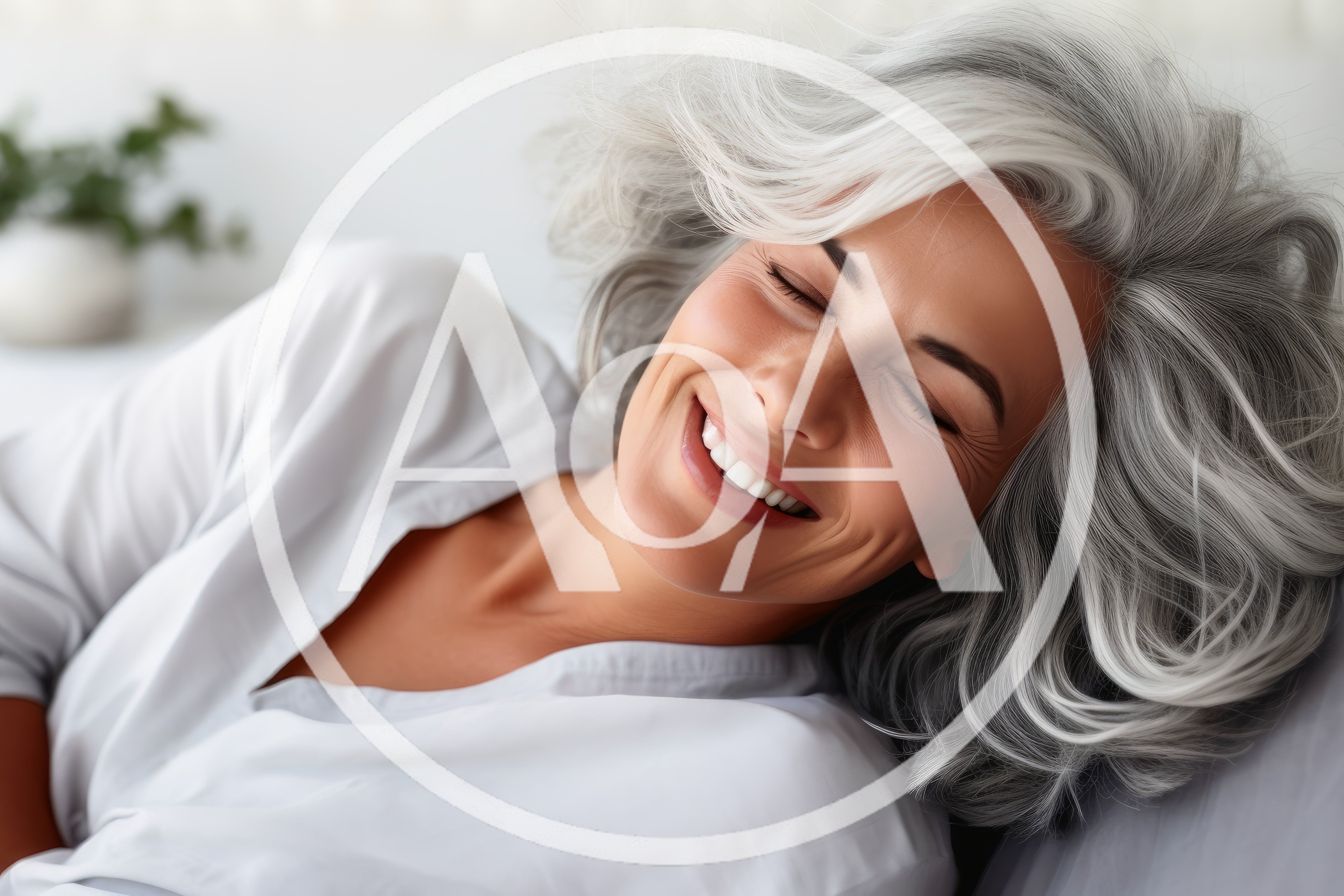 Happy Mature Woman With Gray Hair Resting In Bed