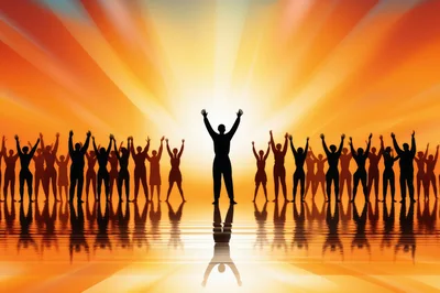 Silhouettes Of People Celebrating With Raised Arms At Sunset