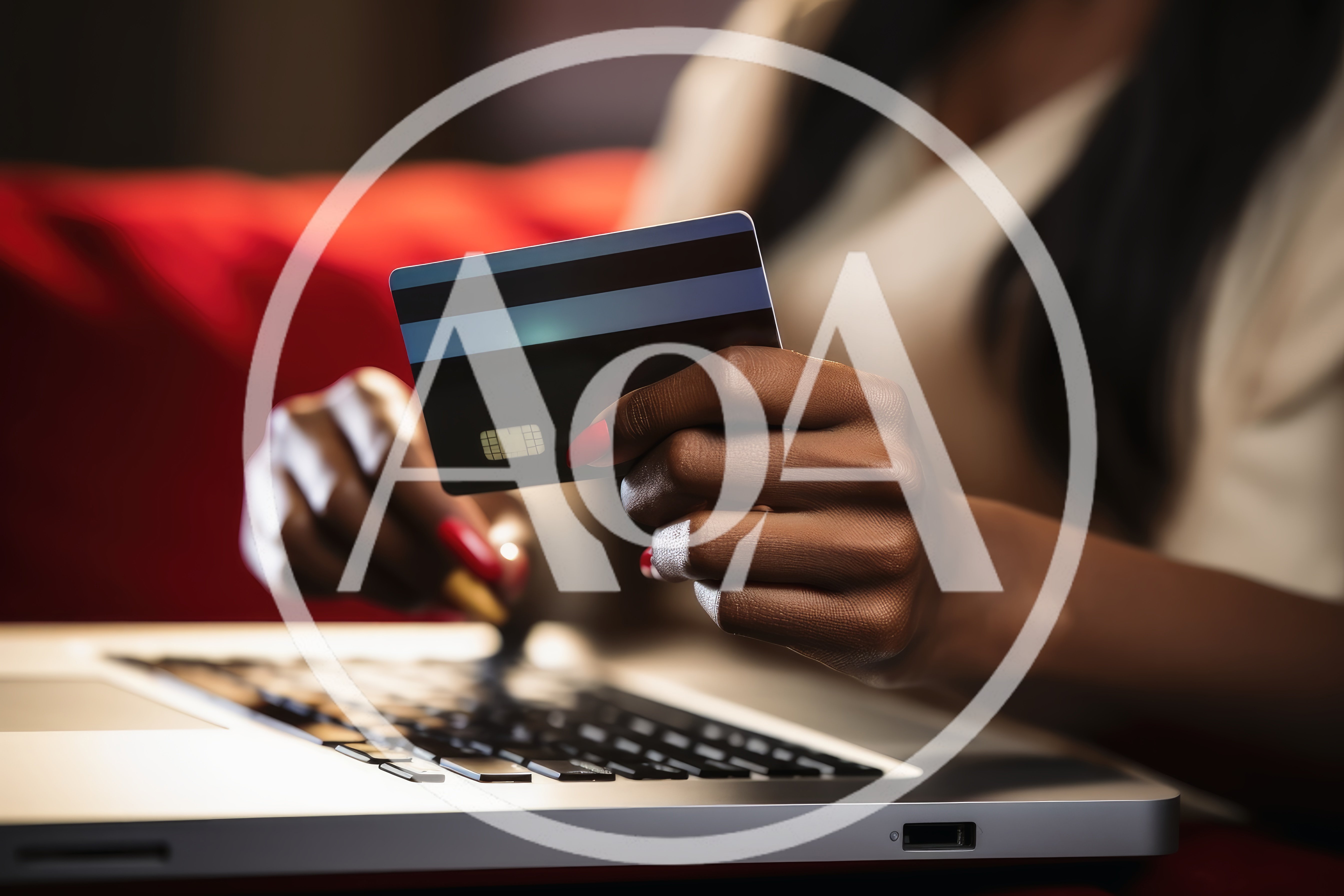 Woman Making Online Purchase With Credit Card On Laptop
