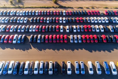 Aerial View Of New Cars Parked In A Lot
