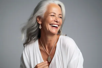 Joyful Mature Woman With Silver Hair Laughing
