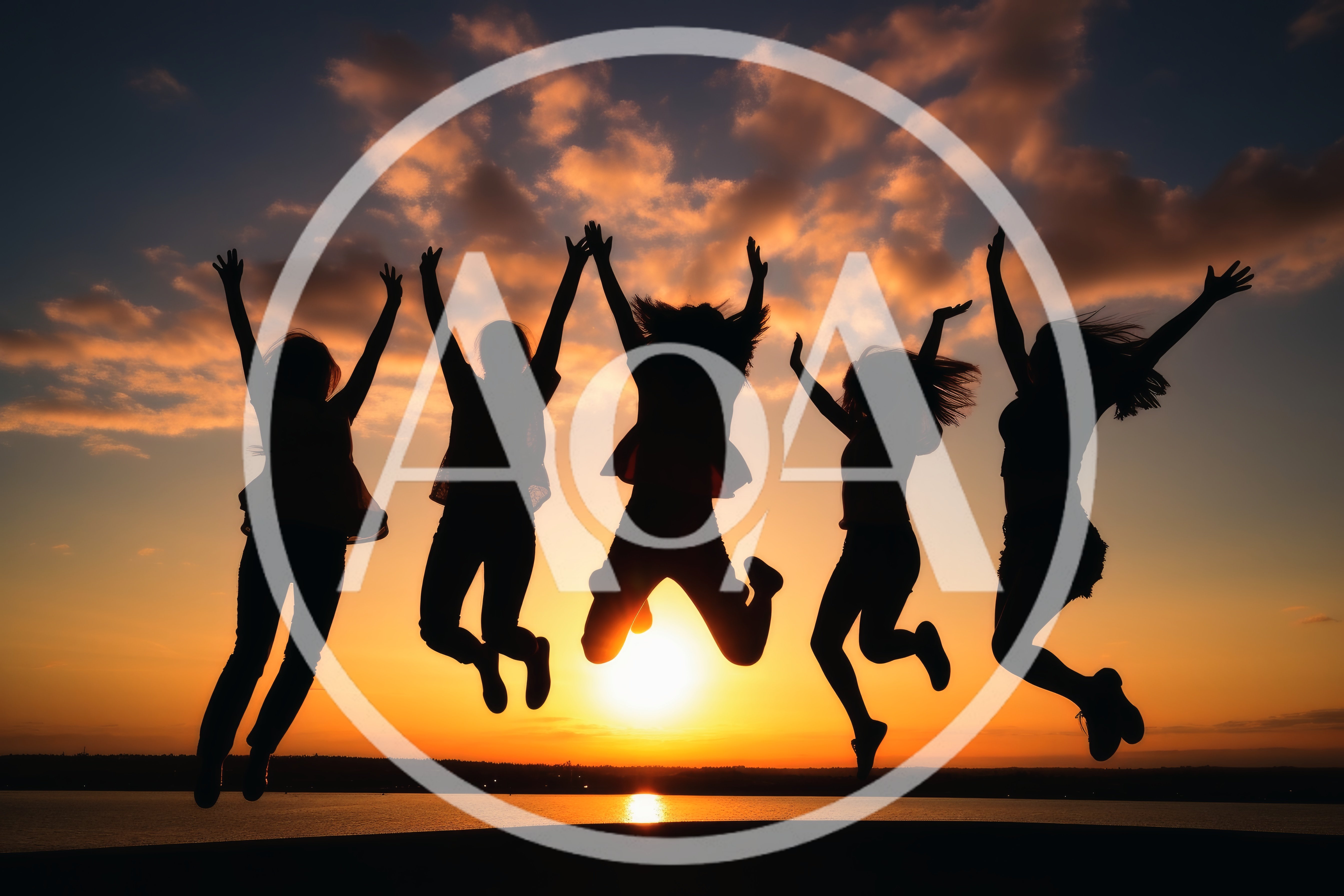 Group Of Friends Jumping Against Sunset Sky