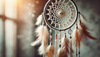 Dreamcatcher Hanging Against A Softly Lit Window
