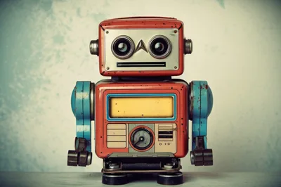 Vintage Tin Toy Robot Standing On A Surface