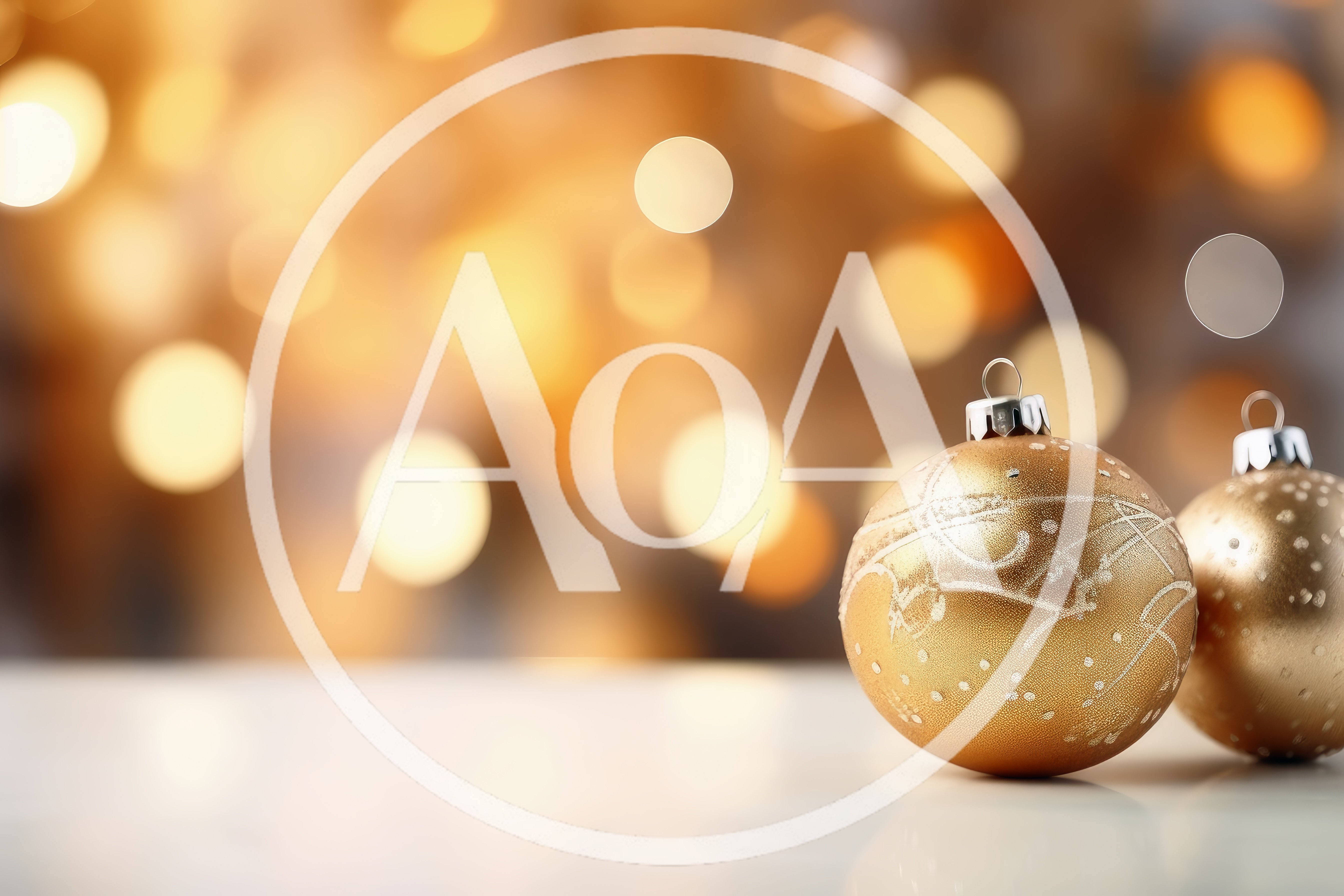 Two Golden Christmas Ornaments On A Reflective Surface