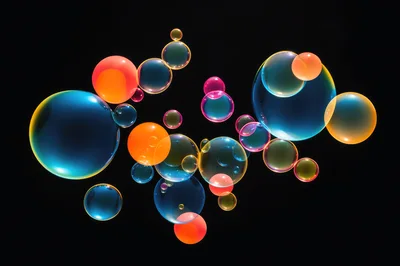 Floating Colorful Soap Bubbles On Black Background