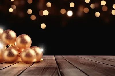 Golden Christmas Ornaments on Wooden Table