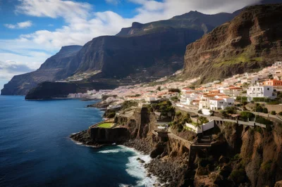 Coastal Town Nestled Beneath Dramatic Cliffs In Madeira