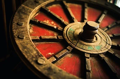 Close Up Of An Antique Wooden Wagon Wheel