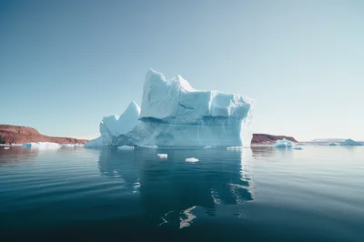 Large Iceberg Floating In Calm Arctic Waters