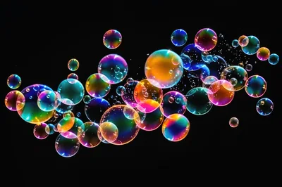 Floating Iridescent Soap Bubbles On Black Background