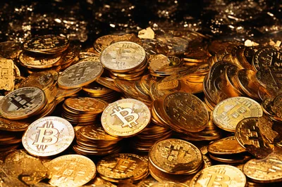 Pile of Shiny Gold Bitcoin Cryptocurrency Coins