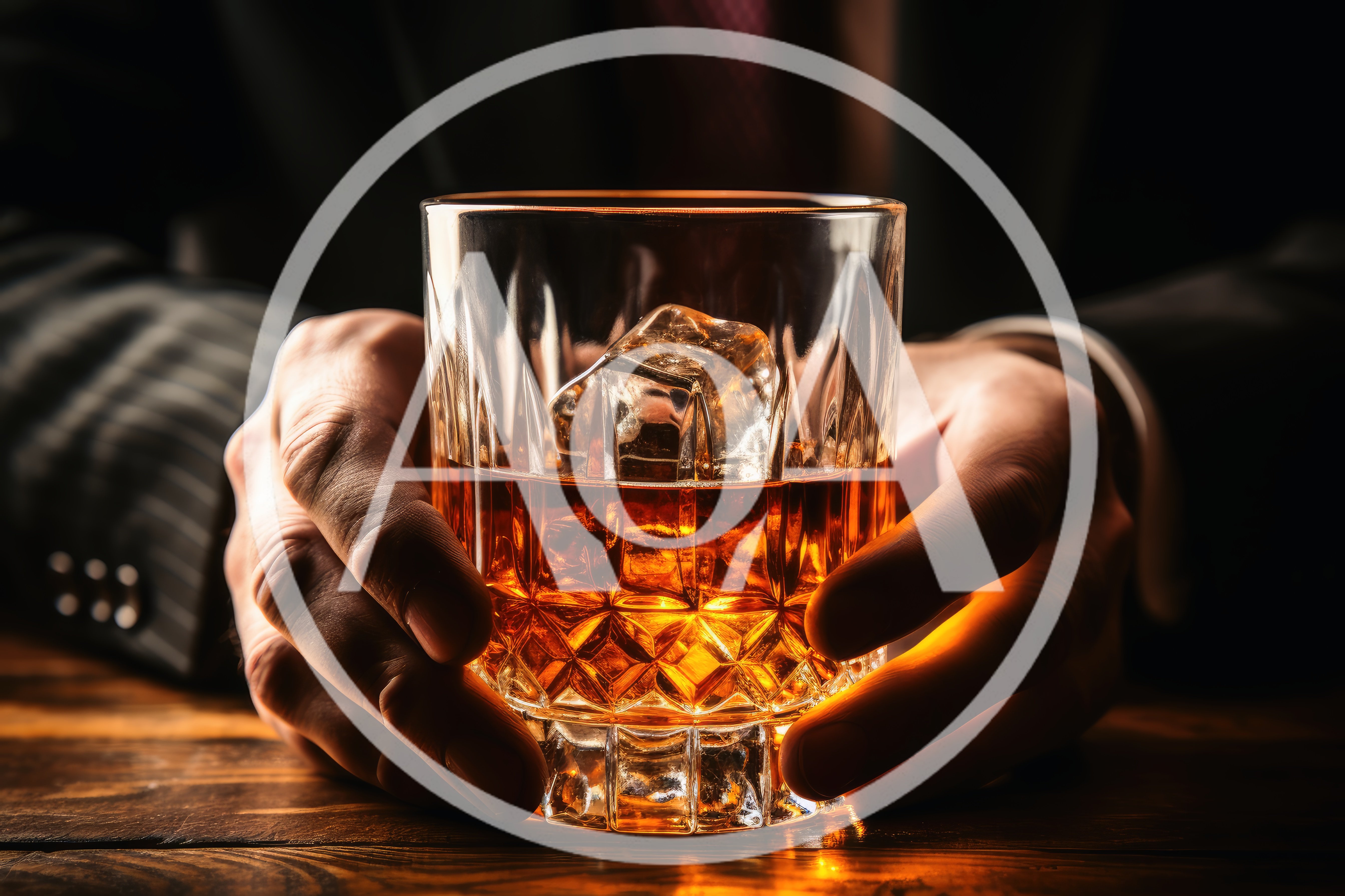 Businessman Holding A Glass Of Whiskey With Ice