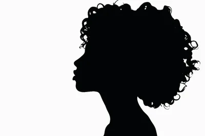 Silhouette Profile Of A Woman With Curly Hair