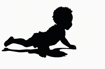 Silhouette Of A Baby Crawling On White Background