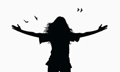 Silhouette Of A Woman With Arms Outstretched