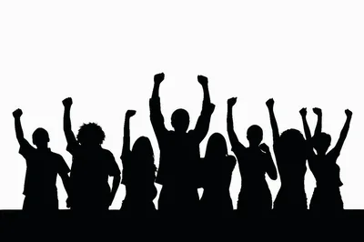 Silhouettes Of A Diverse Group Celebrating With Raised Arms