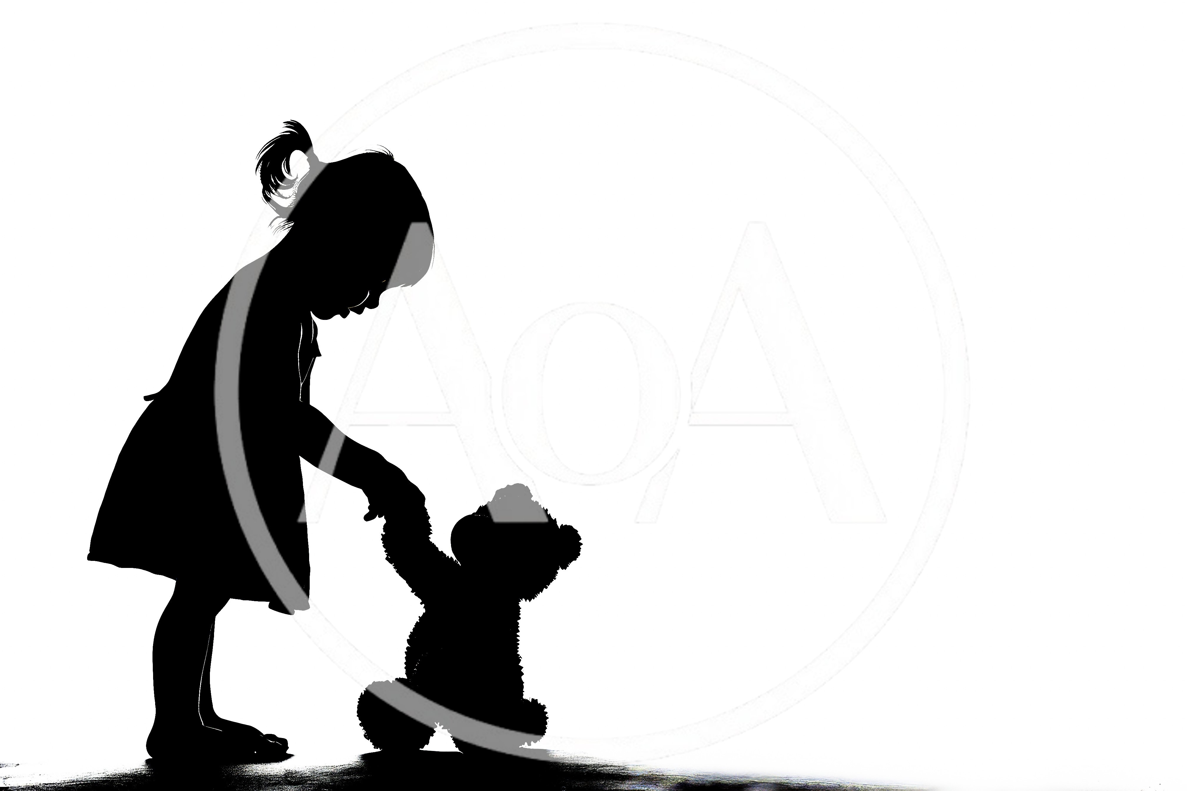 Silhouette Of A Little Girl Holding A Teddy Bear