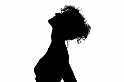 Silhouette Of A Woman Looking Upwards