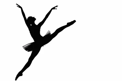 Silhouette Of A Ballerina Performing A Grand Jete
