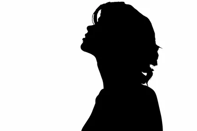 Silhouette Of A Woman Looking Upwards