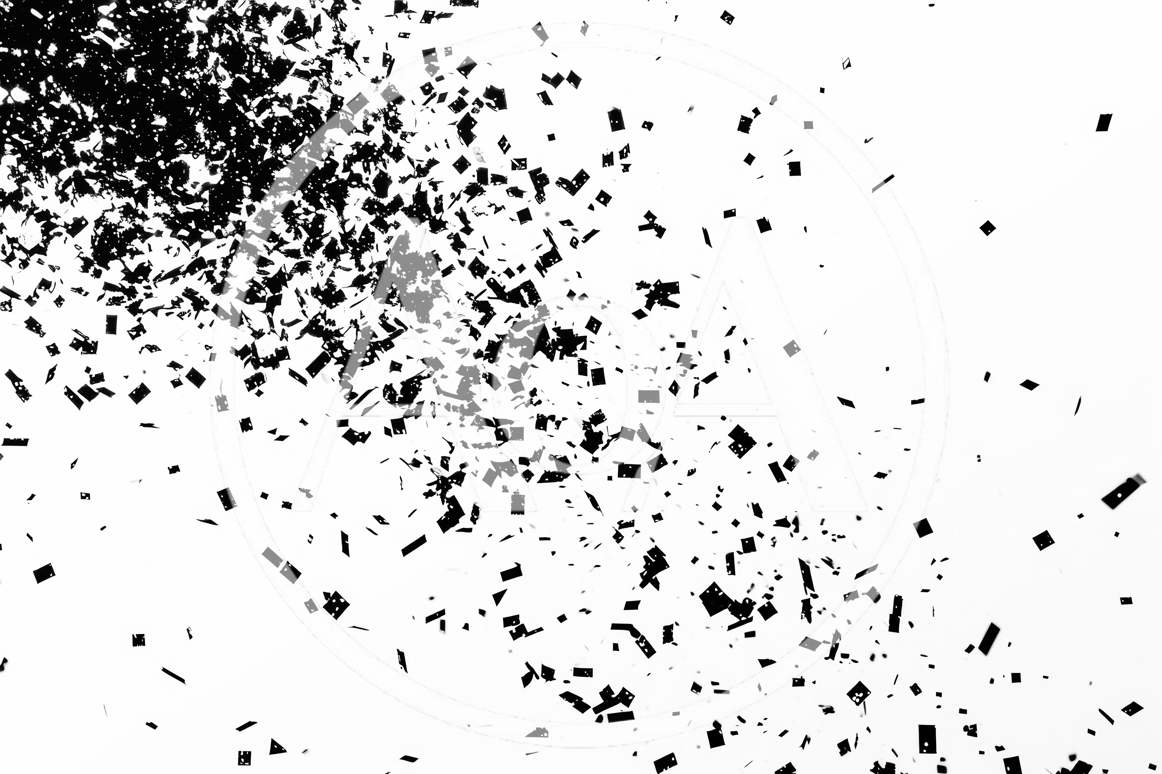 Black Confetti Particles Exploding On White Background