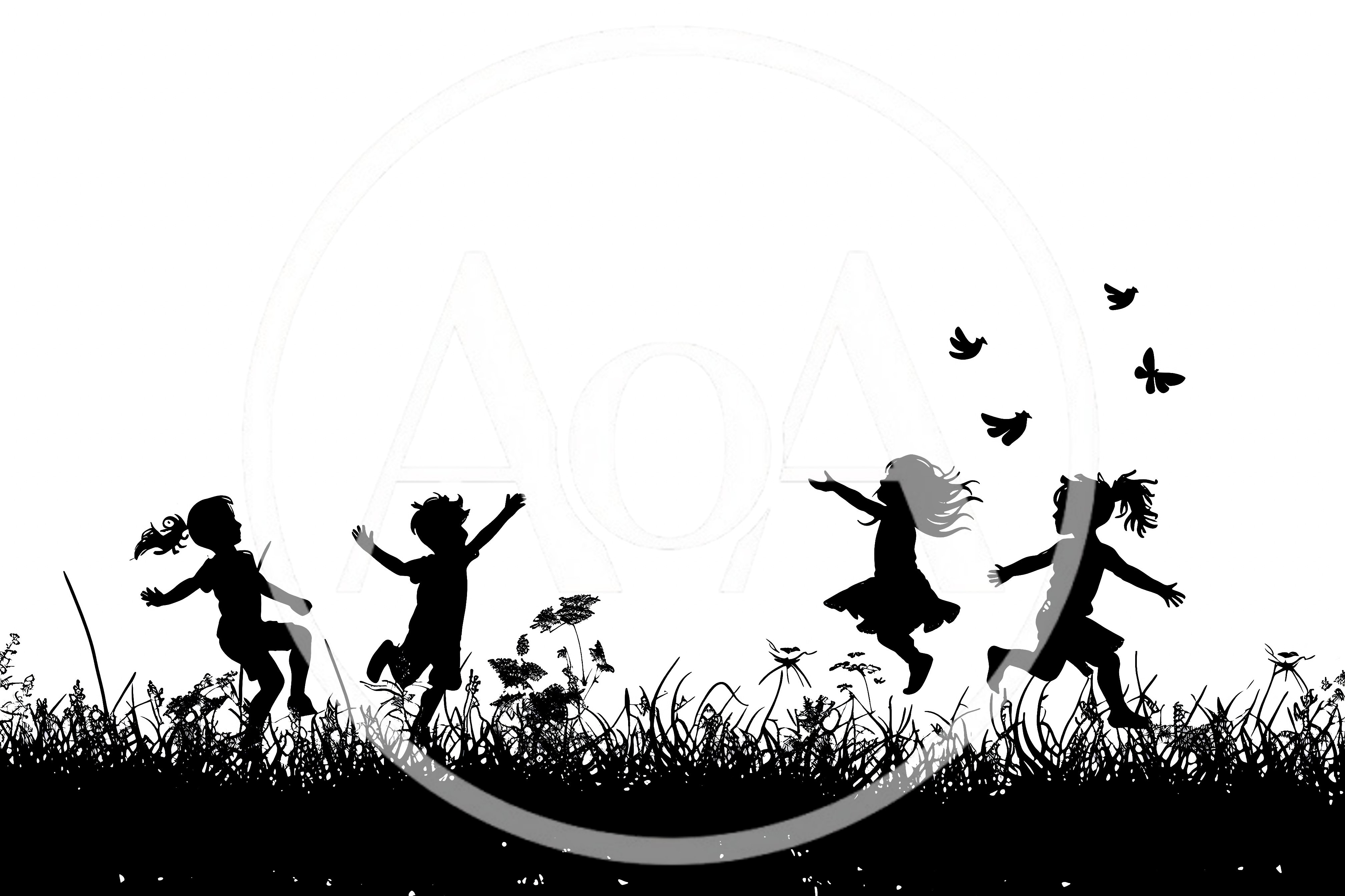 Silhouettes of Happy Children Playing in a Meadow