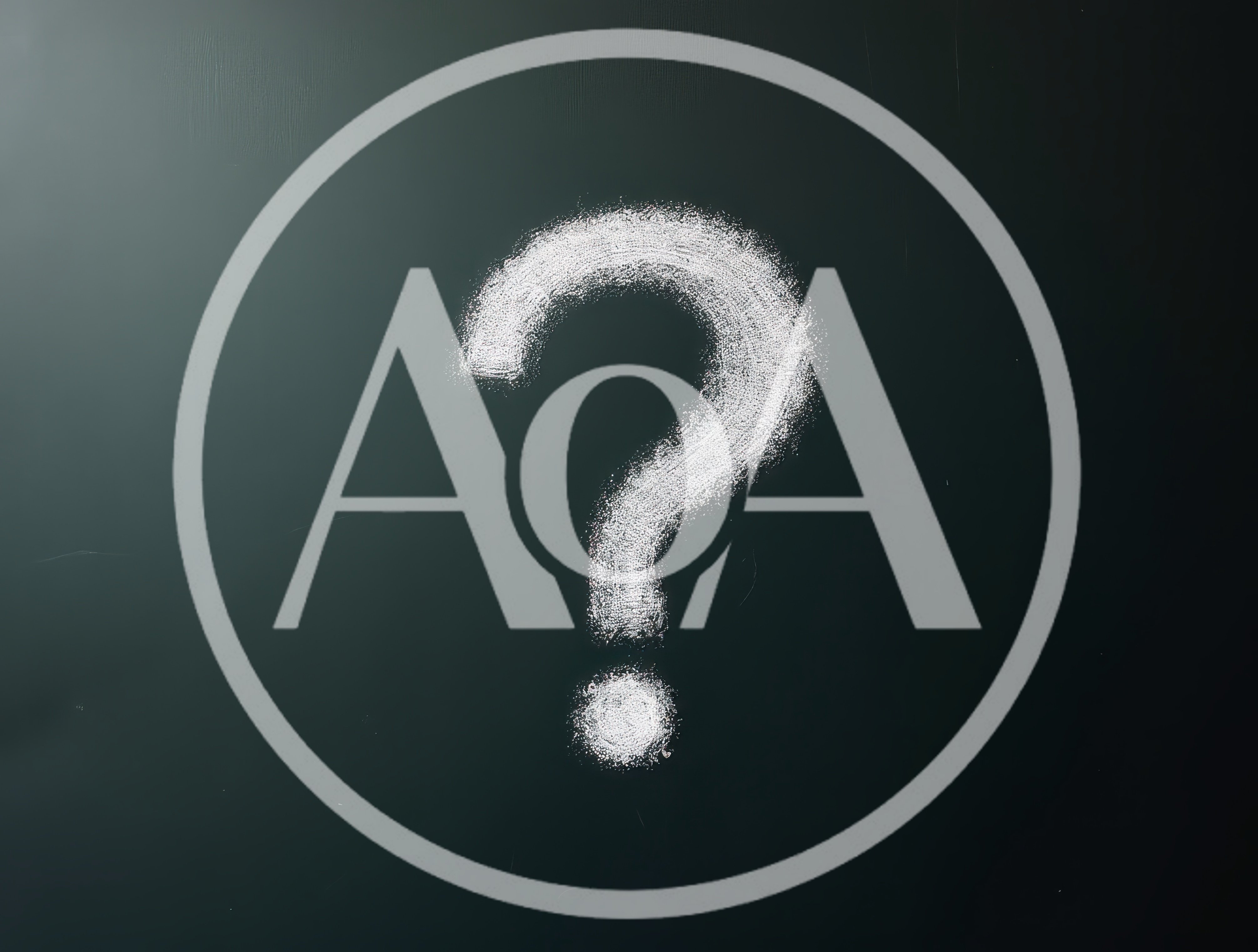White Chalk Question Mark On A Dark Blackboard