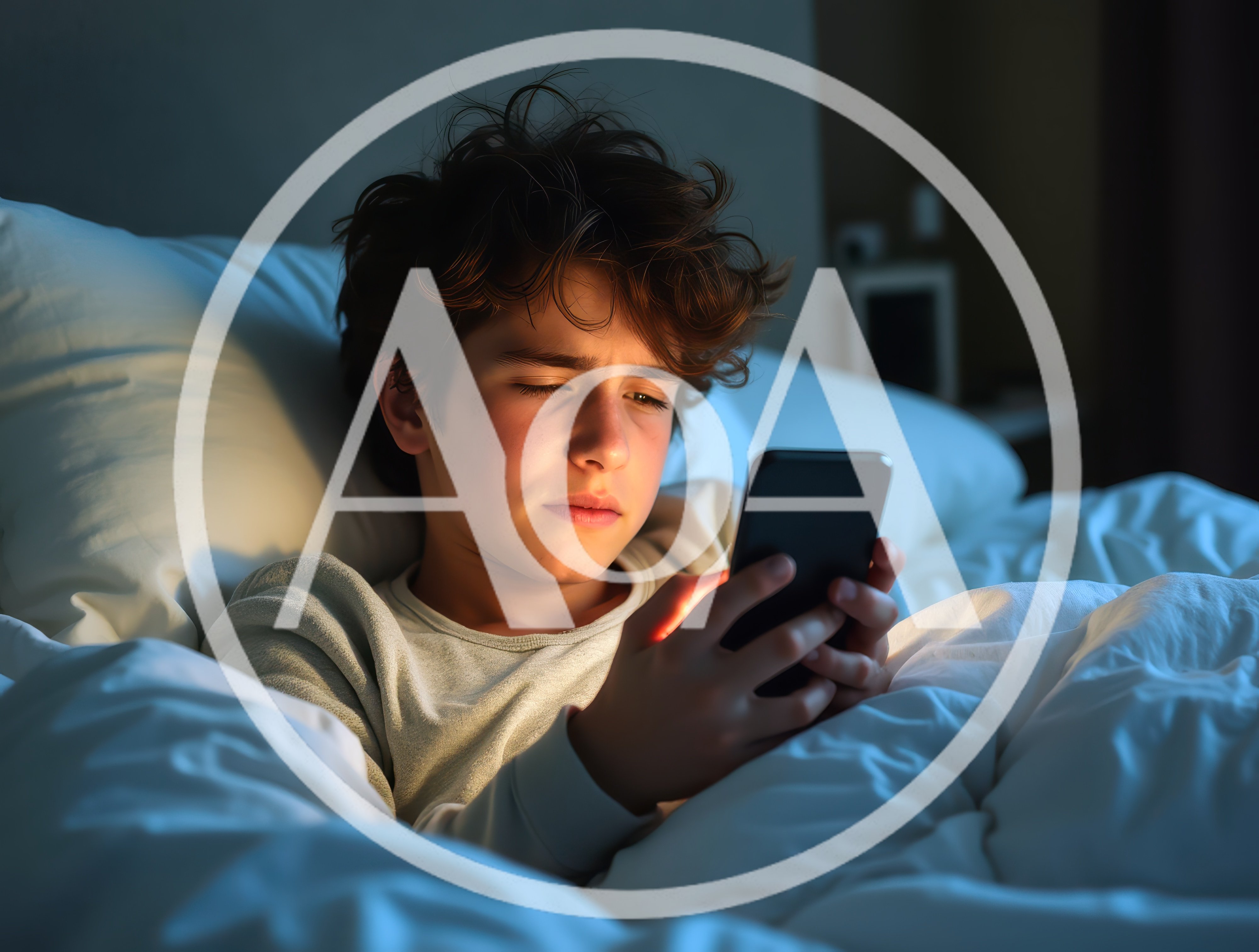 Sick teenager using smartphone in bed at night