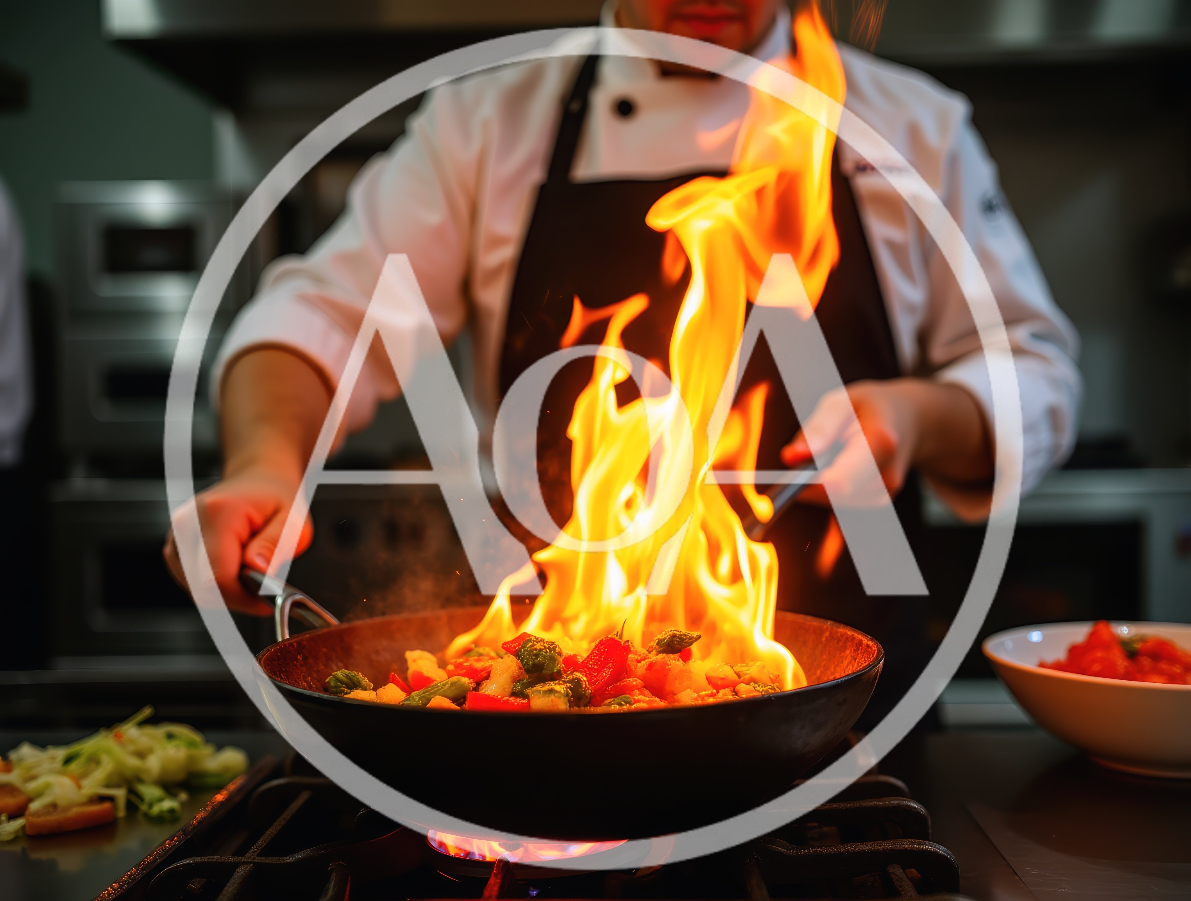 Professional Chef Flambeing Vegetables In A Restaurant Kitchen