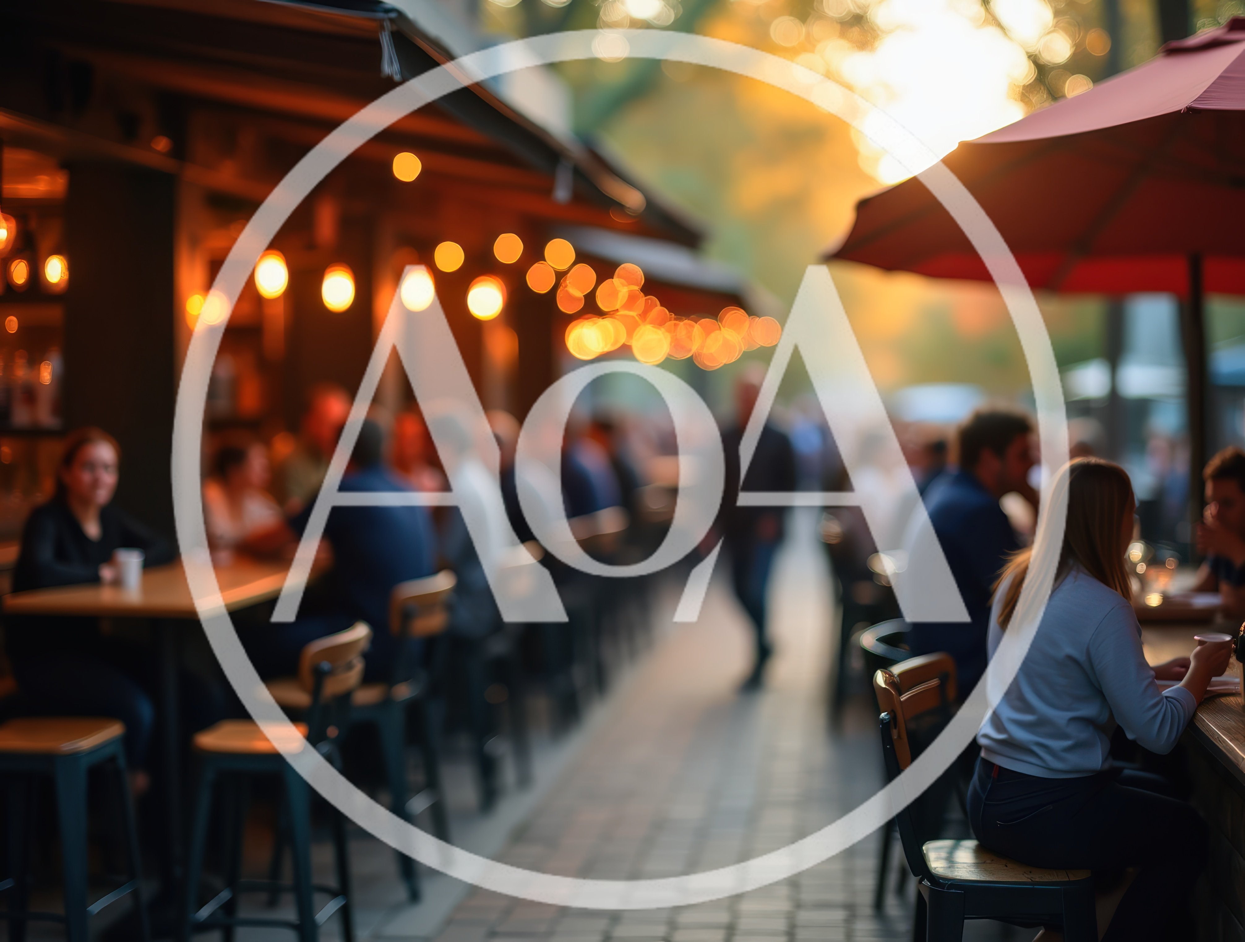 People Dining At Outdoor Restaurant Patio At Sunset