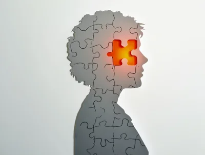 Puzzle Piece Silhouette Representing Mental Health Concept