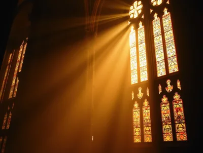 Sunlight Streaming Through Stained Glass Church Windows