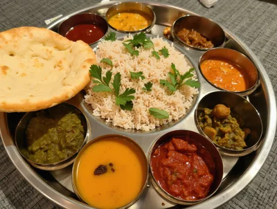 Traditional Indian Thali Platter With Rice And Naan
