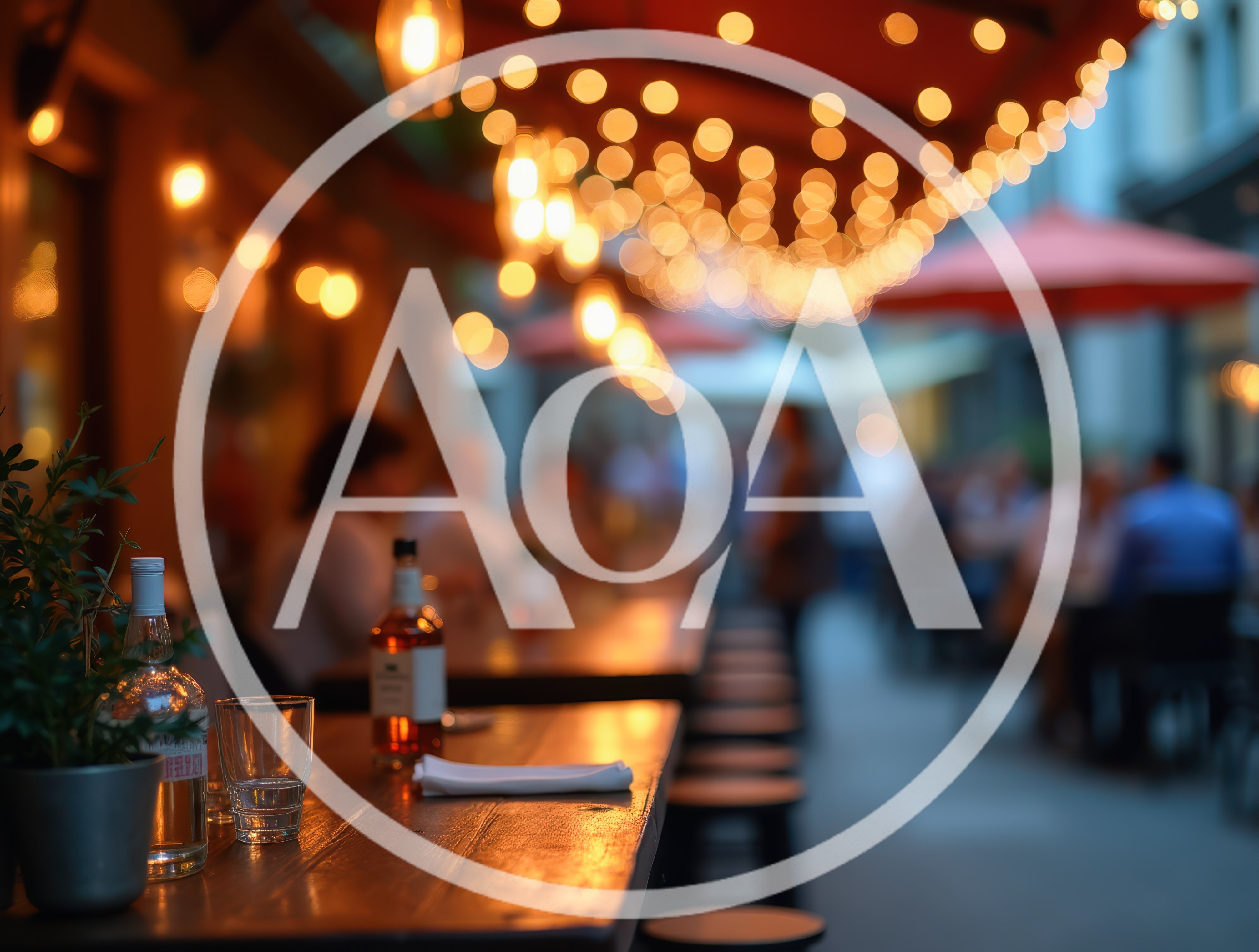 Outdoor Restaurant Terrace With String Lights At Dusk